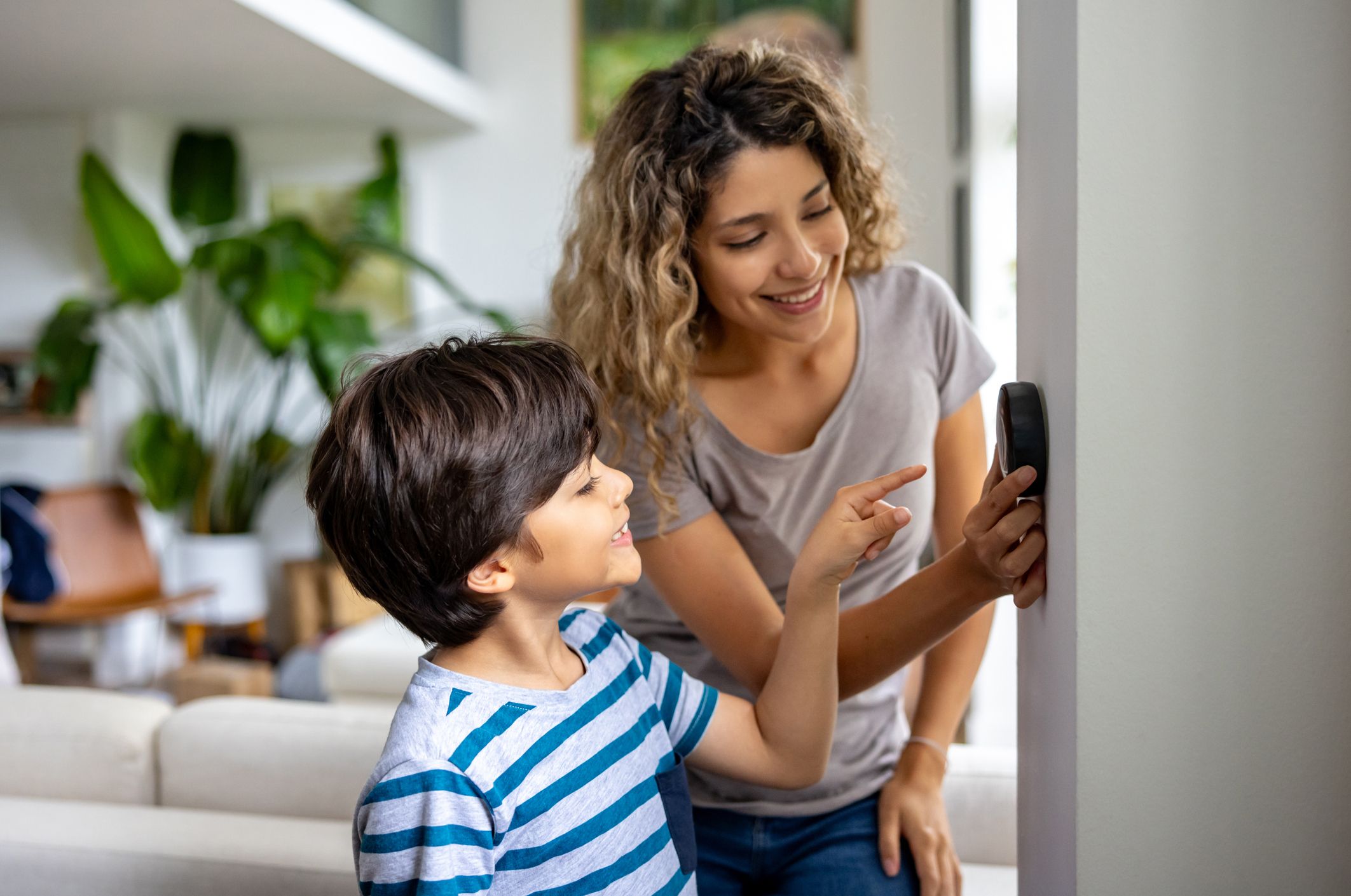Family saving money on heating and cooling